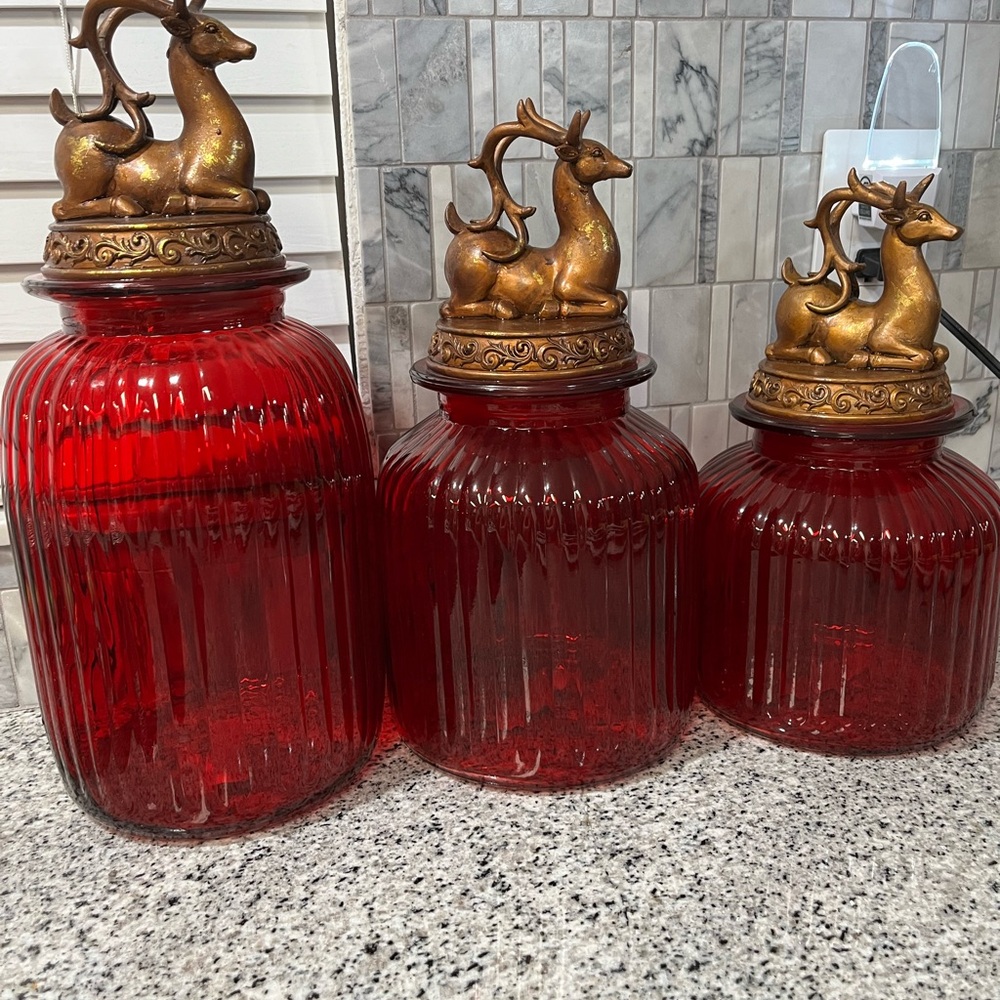 3 red reindeer Christmas glass canisters, 11, 9 and 7 inch